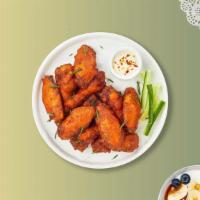 It'S A Wing Thing · Fresh chicken wings, breaded, fried until golden brown, and tossed in hot sauce.