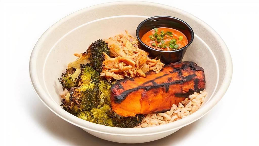 The Charred Bowl · Signature pulled chicken, charred broccoli, charred sweet potato, coconut brown rice, signature sauce on the side
