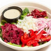 The Gigi · Romaine and shredded kale mix, goat cheese tzatziki beets, sliced red onion, roasted red pep...