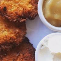 Potato Latkes · 3 to an order, comes with sour cream and applesauce