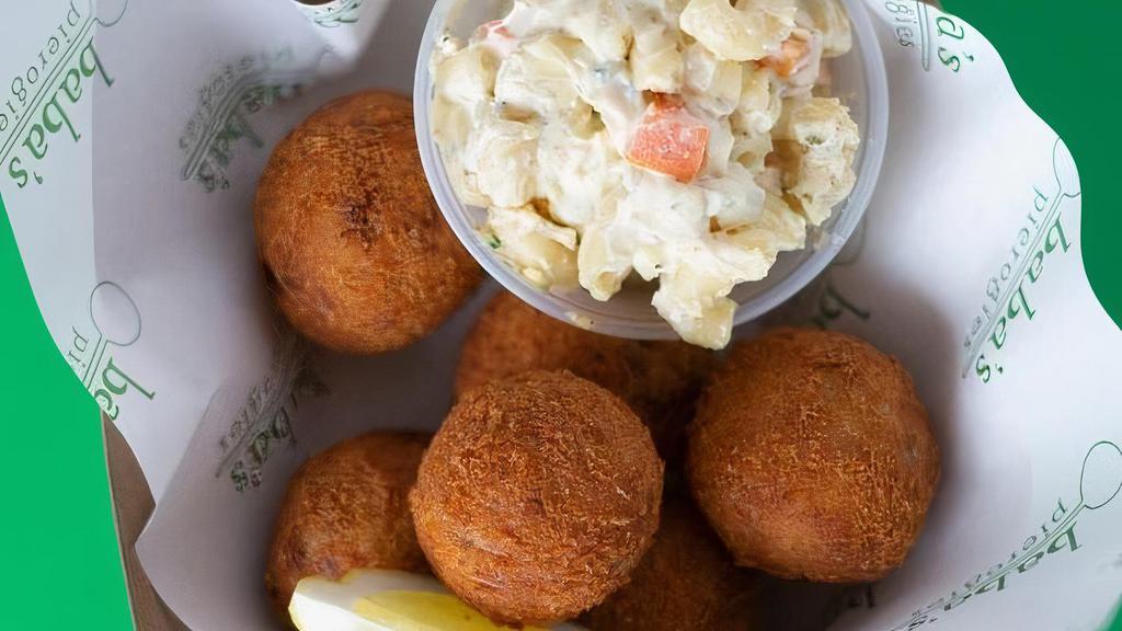 Schnitzel Bites · We've reimagined the classic schnitzel! Bite sized ground pork and chicken breaded and deep fried. Comes with a side of baba's picnic style macaroni salad.. *contains wheat, pork, dairy and egg*