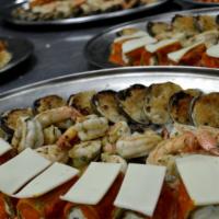 Hot Antipastox2 · A combination of baked clams, shrimps, mozzarella carrozza, stuffed mushrooms, grilled porto...