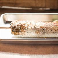 Elote · Corn on the cob with chipotle mayo, cheese, chile and lime