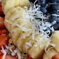 Acai Bowl · Blueberries, sliced banana, strawberry slices, agave drizzle, fresh granola.