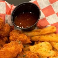 Crusted Fried Shrimp & Scallops With Fries · Delicious shrimp and scallops topped with sweet chilli sauce.