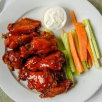 Jumbo Buffalo Wings · Served with celery & carrot sticks, with home-made blue cheese dressing.