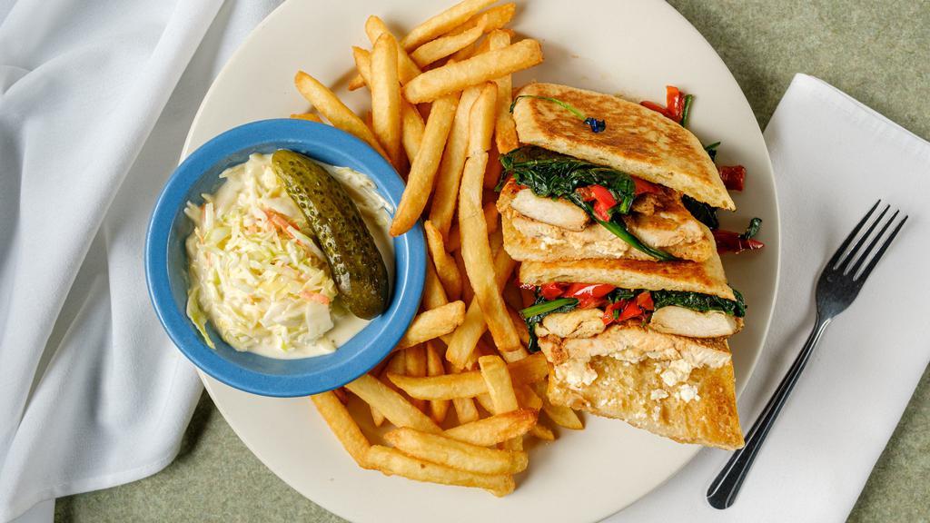 Ionian Panini · Grilled chicken breast, fresh spinach, red peppers, feta cheese, served with tzatziki.