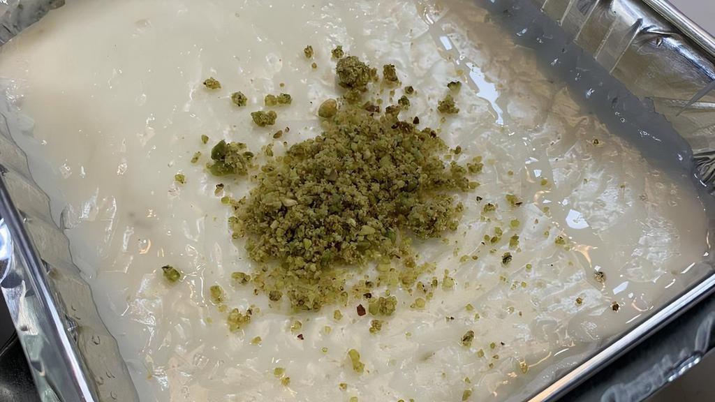 Firnee · Homemade custard made with sweet milk, cinnamon, rose water and cardamon. Garnished with minced pistachios.