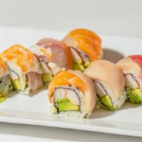 Rainbow Roll · Tuna, salmon, yellowtail, shrimp and stripe bass wrapped with kani and avocado.
