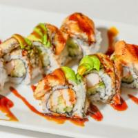 Dragon Roll · Eel avocado wrapped with kani and cucumber.