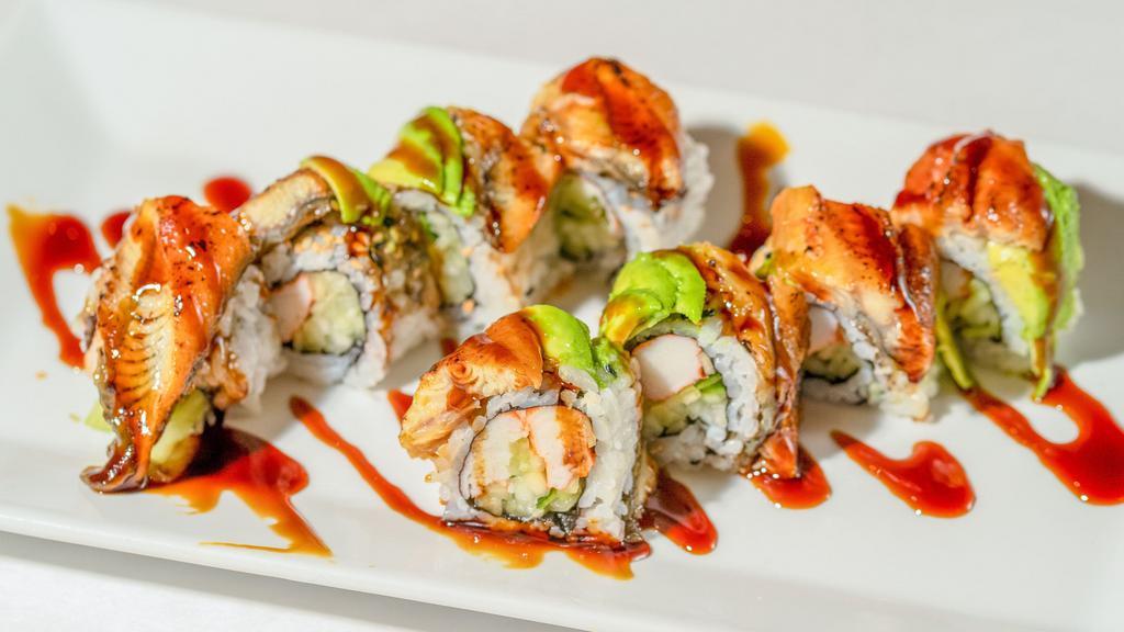 Dragon Roll · Eel avocado wrapped with kani and cucumber.