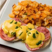 Eggs Benedict · Two poached eggs on a toasted english muffin with Canadian bacon & hollandaise sauce