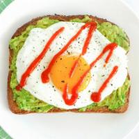 Classic Avocado Toast · Classic avocado toast with chili flakes, olive oil, and black pepper.