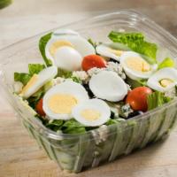 Cobb Salad · Romaine lettuce with bleu cheese, hard-boiled egg, black olives, cherry tomatoes and cucumbe...
