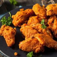 Plain Wings · 8 juicy deep-fried chicken wings. Comes with a bleu cheese sauce and a side of celery and ca...
