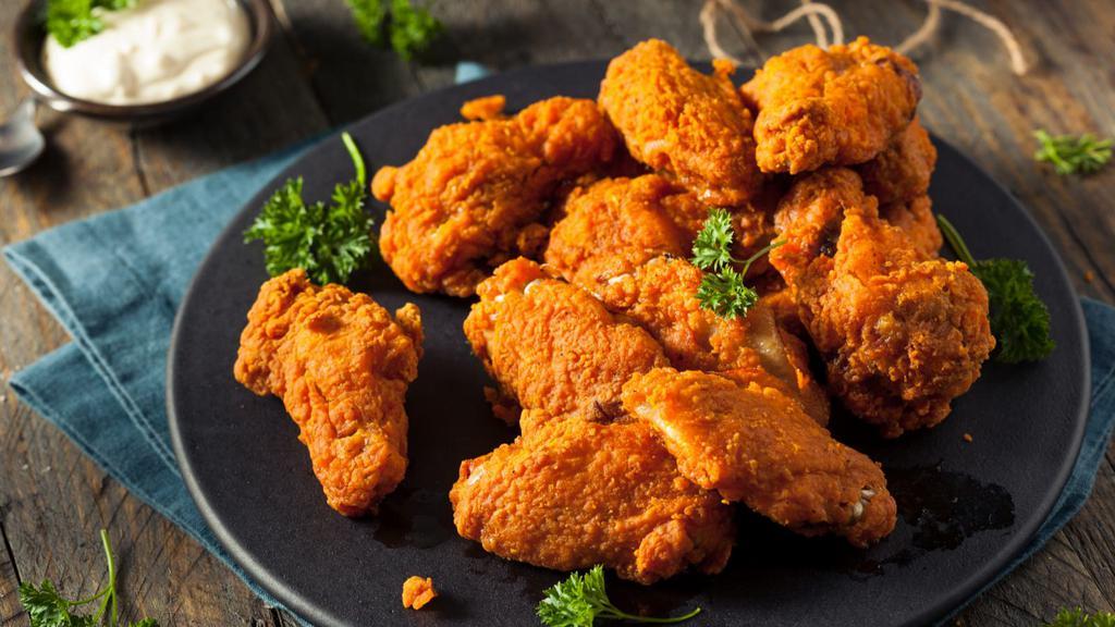 Plain Wings · 8 juicy deep-fried chicken wings. Comes with a bleu cheese sauce and a side of celery and carrots.