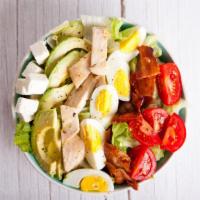 Cobb Salad · Fresh salad made with sliced lean chicken breast, shredded carrots, mushrooms, tomatoes, and...