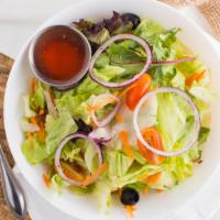 Tossed Salad · Lettuce, tomatoes, onions, carrots, and olives.