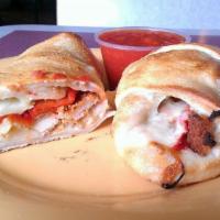 Chicken Cutlet Wrap · With lettuce, tomatoes, onions, and ranch dressing.
