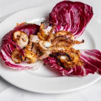 Calamari Alla Griglia · Slightly breaded grilled squid w/ chopped tomatoes
