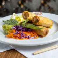 Vegetarian Spring Rolls · Crispy veggie roll filled with carrot, glass noodles, shiitake mushroom and cabbages. Served...