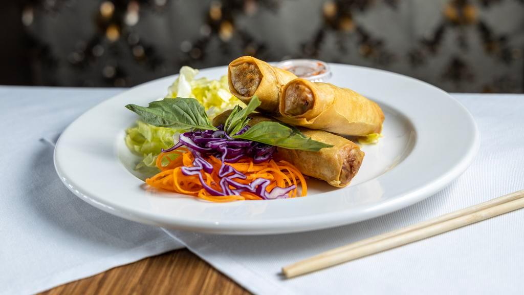 Vegetarian Spring Rolls · Crispy veggie roll filled with carrot, glass noodles, shiitake mushroom and cabbages. Served with plum sauce. Vegetarian.