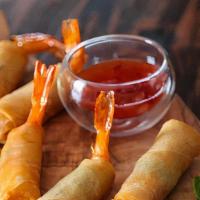 Crab Meat &  Shrimp Rolls  · Large shrimp,  crab meat  and thai herbs wrapped in a crispy skin spring roll and chili dipp...