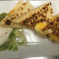 Chicken Quesadilla Apt · Flour tortilla filled with chicken and cheese and pico de gallo served with guacamole and so...
