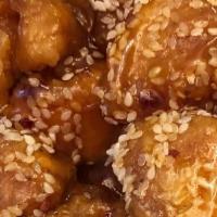 Sesame Chicken · Spicy. Includes egg roll.