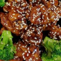 Sesame Chicken Lunch · Served with choice of side and rice.