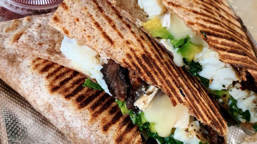 Veggie Quesadilla · Egg whites, kale, spinach, brie cheese and avocado.