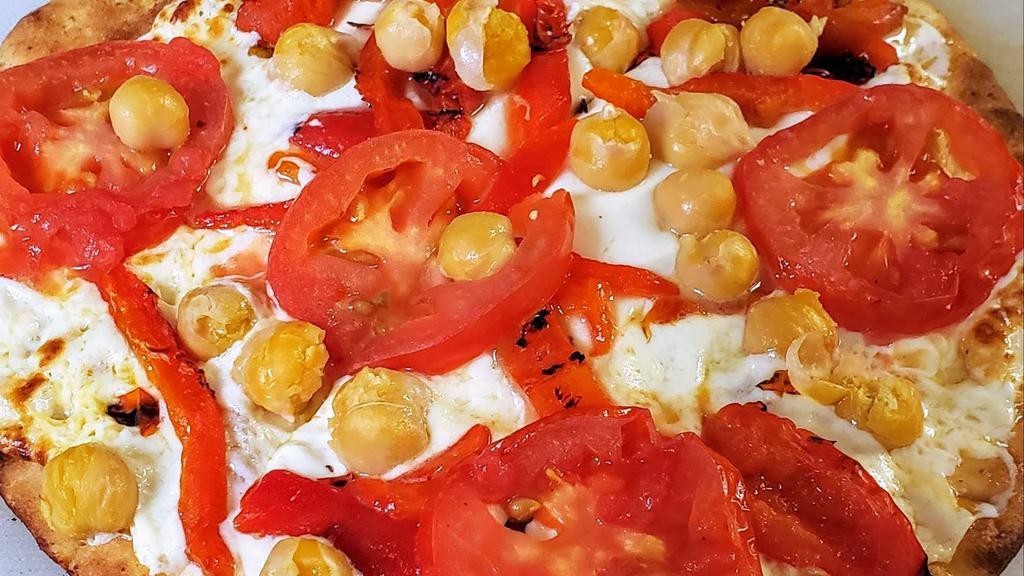 Mediterranean Flatbread · Chick peas, roasted red peppers, fresh mozzarella, tomato and olive oil.