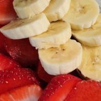 Classic Acai - Strawberry Banana & Almond Milk · Garnished on top with fresh strawberries and banana.
(base made with Acai)