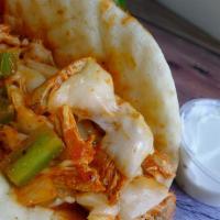 Buffalo Chicken Gyro · All natural chicken gyro with our blazin buffalo sauce, lettuce, tomato and optional white s...