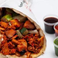 Chicken Gyro · Served on pita with choice of salad and Shah's sauces.