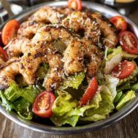 Shrimp Salad · Grilled Cajun seasoned shrimps with crisp hearts of romaine mixed with red onions, carrots, ...