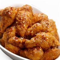 Soy Fried Wings · Soy garlic wings. Our soy garlic chicken is double fried with our special frying technique t...