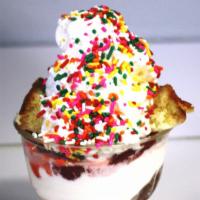 Strawberry Shortcake · Vanilla Ice Cream, strawberries on top of a thick slice of poundcake. Topped with homemade w...