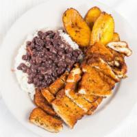 Chicken Cutlets Platter · Sliced chicken cutlets with rice and beans and maduros (sweet plantain).
