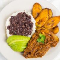 Ropa Vieja · Shredded beef with rice and beans and maduros (sweet plantain).