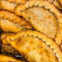 Chicken · 24 Pcs Empanadas stuffed with delicious Chicken and potatoes