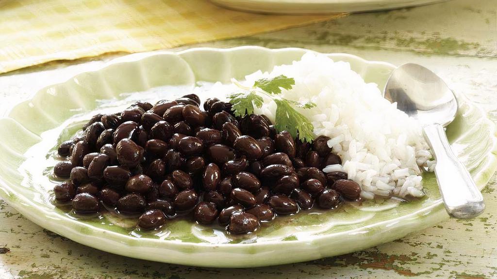 Rice & Black Beans · White jasmine Rice with a Scoop of our sofrito Black Beans on top. = 1 LB