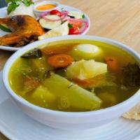 Hen Soup (Sopa De Gallina) · Served with a side of rice, salad, and a portion of the grilled hen. / Incluye arroz, ensala...
