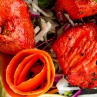 Chicken Tikka · Succulent white meat chunks marinated with our own special spices.