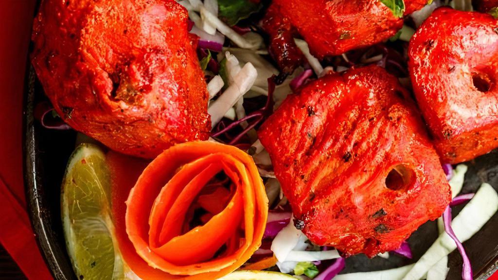 Chicken Tikka · White meat chunks marinated with our special spices.