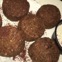 Falafel 6Pcs · Fried traditional patties made with chickpeas and vegetables.
