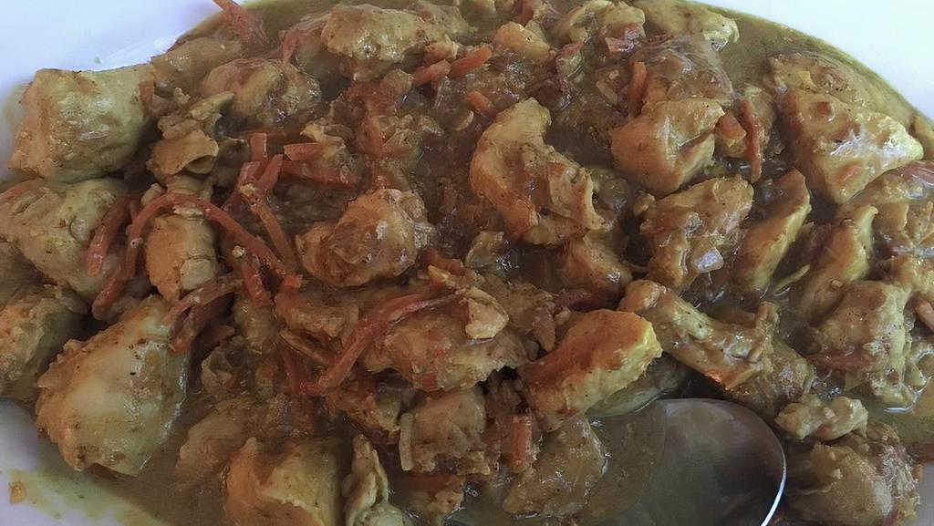 Chicken Curry · Pulled chicken in a rich homemade curry sauce.