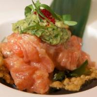 Spicy Salmon Tartar · Served with guacamole and wasabi chips.