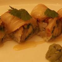 Lower Manhattan Roll · Yellowtail jalapeno avocado topped with seared white tuna and cilantro with yuzu miso sauce....