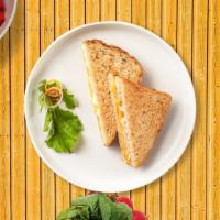 Classic Cheddar Cheese Sandwich · Cheddar cheese on a bread.